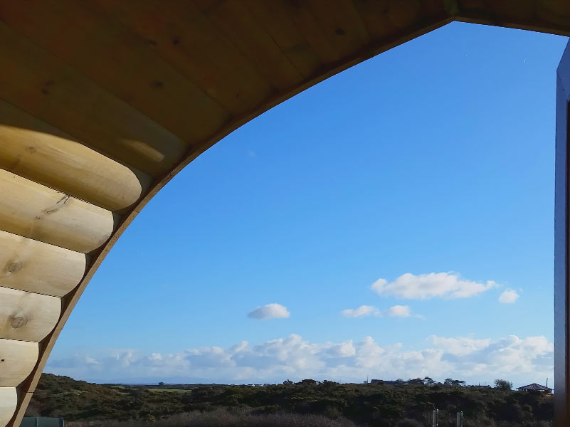 View of blue sky from Glamping Pod porch