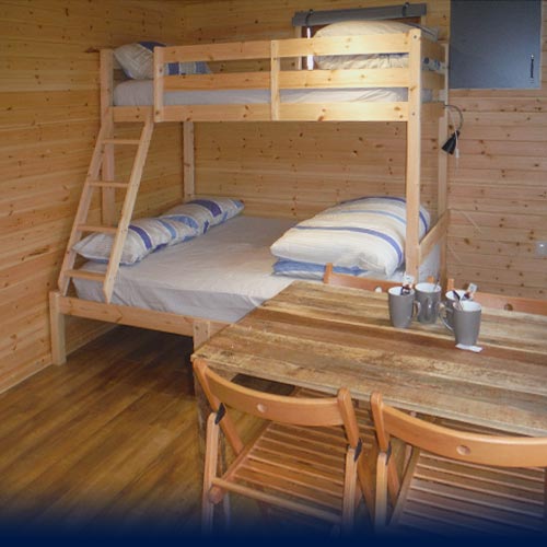 Bunk Beds and dining area inside the Eco Den