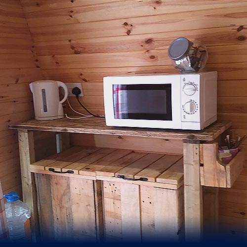 Glamping Pod kitchenette with kettle and microwave